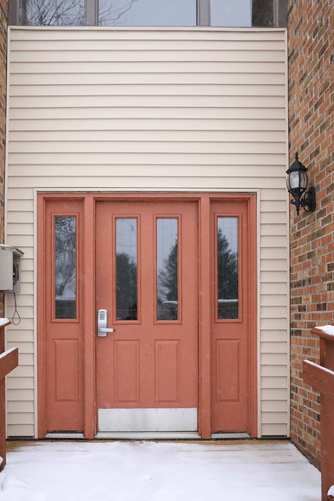 Coral entry door with sidelights
