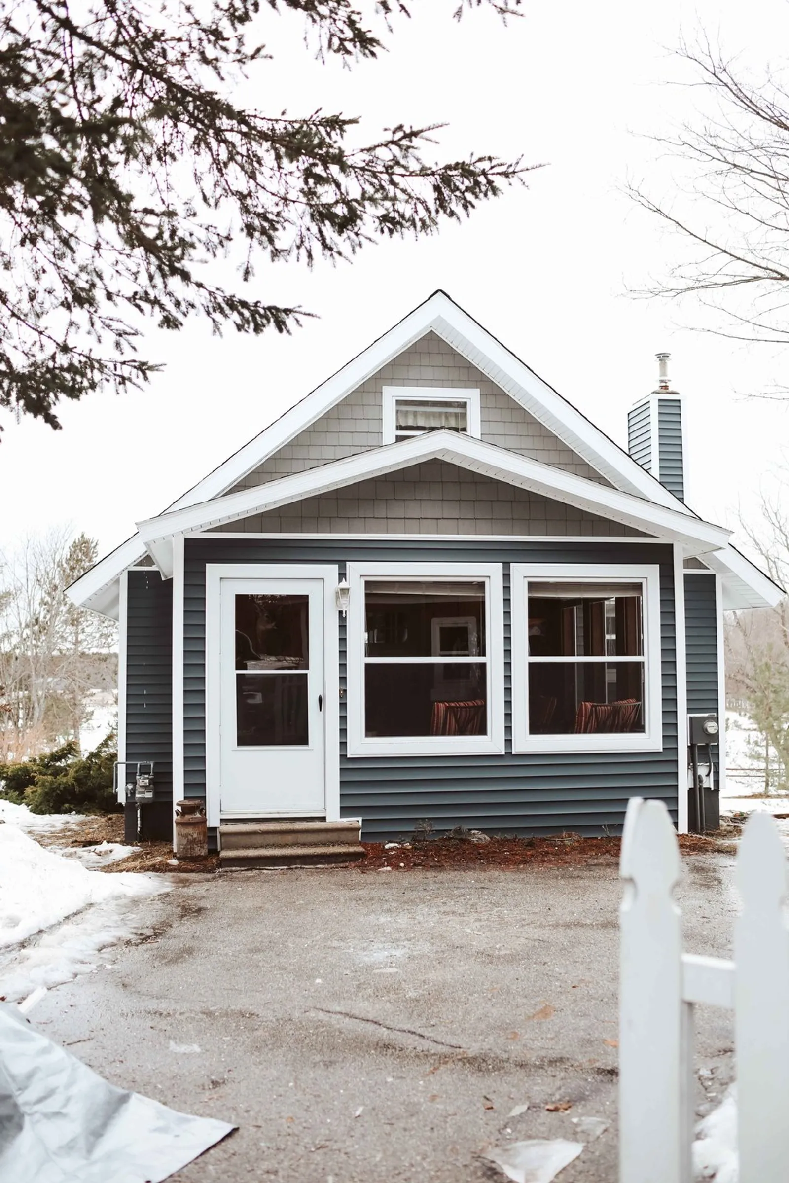 Bay window on a blue bungalow