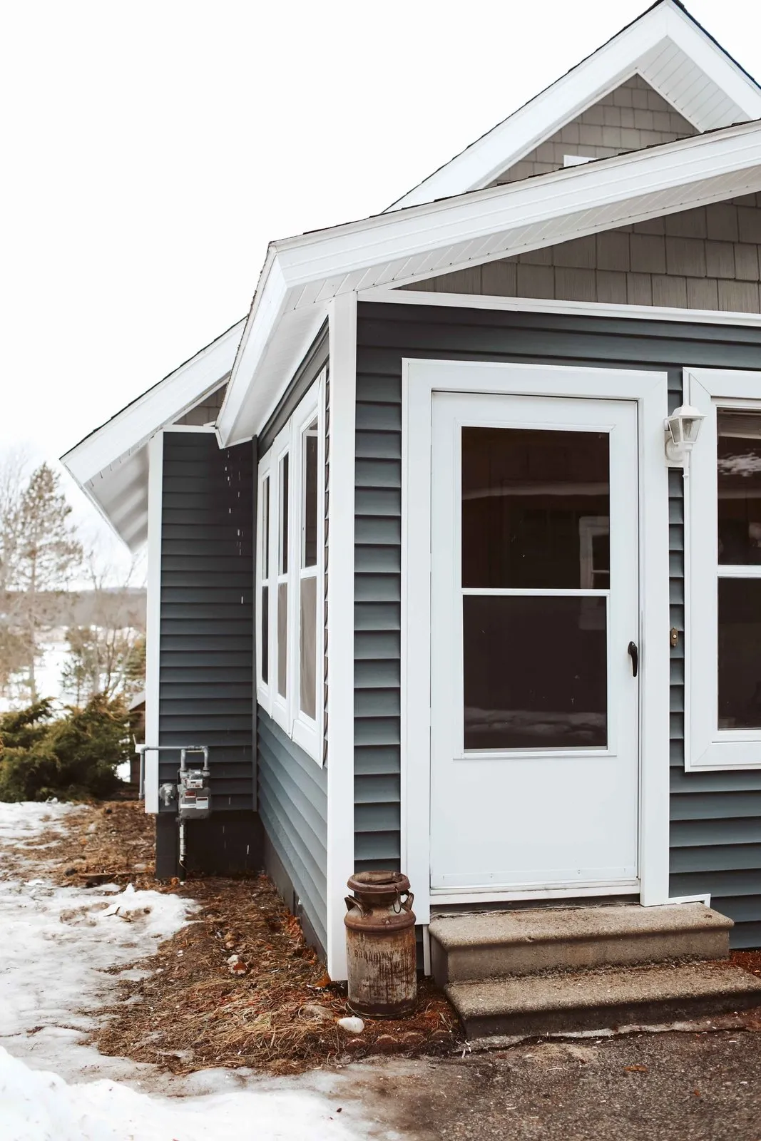 Bay window and casements, grey bungalow
