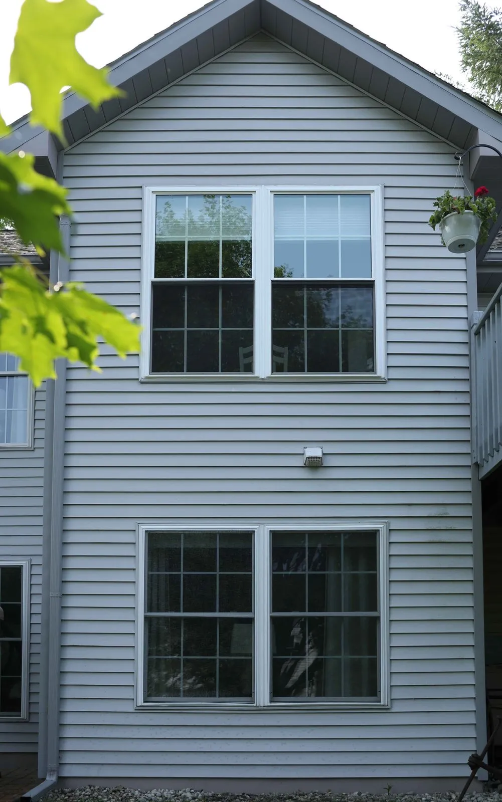 Double-hung replacements, blue lap siding